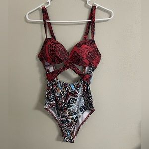 Size small one piece swimsuit with cutout. NWOT